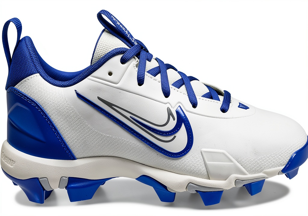 Young player wearing Trout 9 cleat on a baseball field